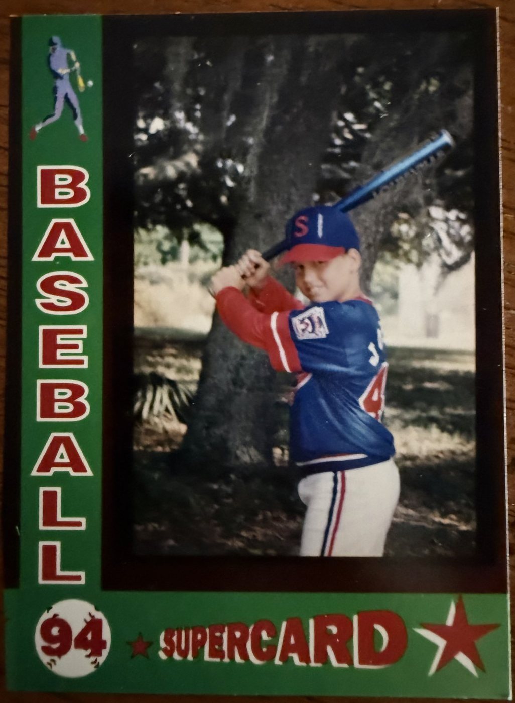1994 youth baseball card showing Heath in a batting stance